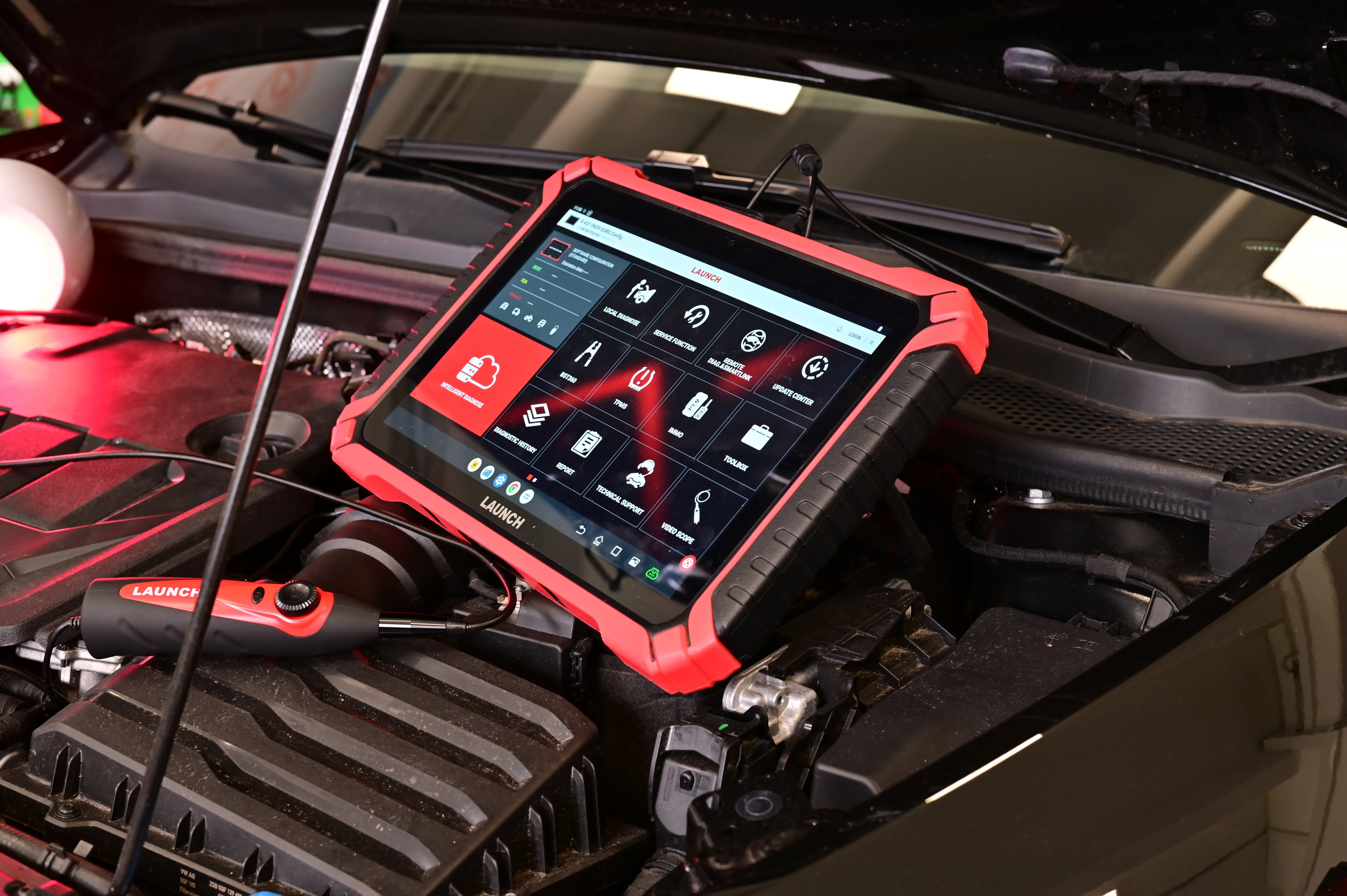 A Launch diagnostic tablet using Security Gateways to access protected vehicle systems in a modern workshop.